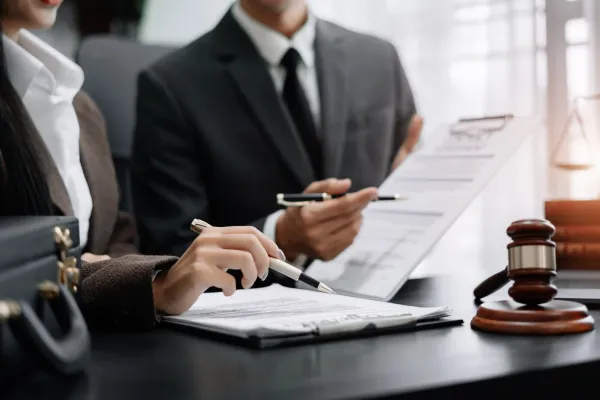 Employment lawyers working on a document.